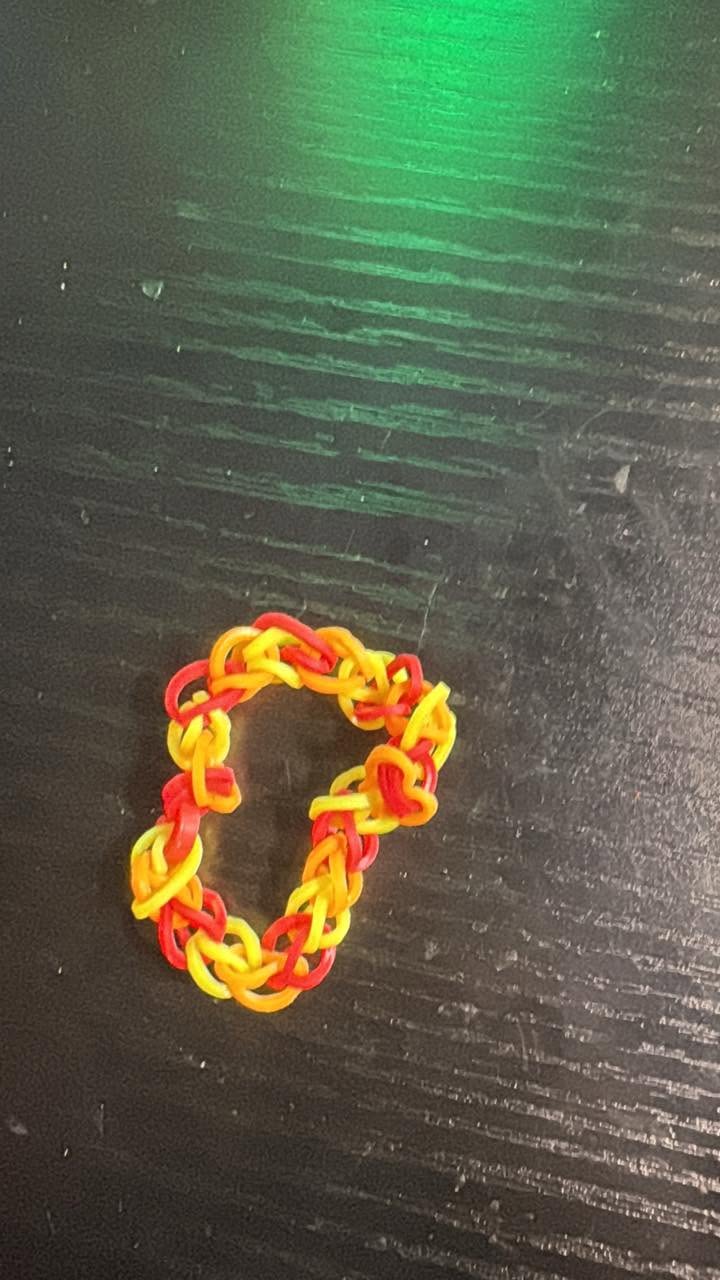 This one is a orange, yellow, and red bracelet for adults