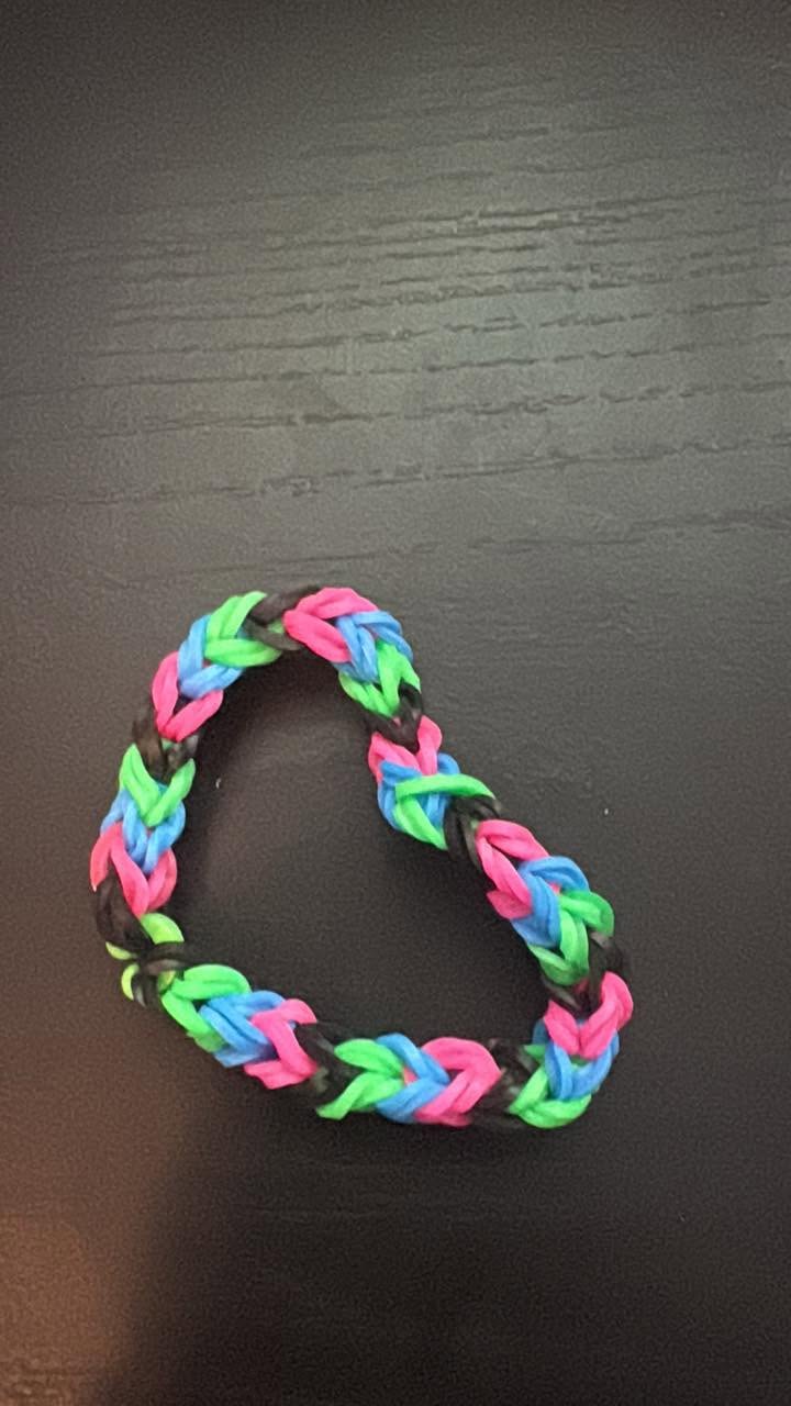 This rainbow double band bracelet is designed for adults